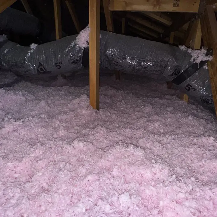 Blown-in insulation between rafters, Central Texas