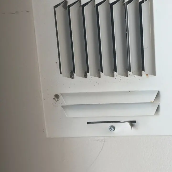 Ceiling grille before cleaning, Central Texas