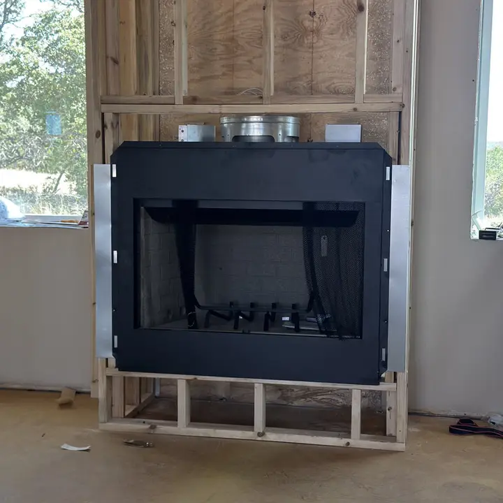 Firebox with chimney pipe in the frame, Central Texas