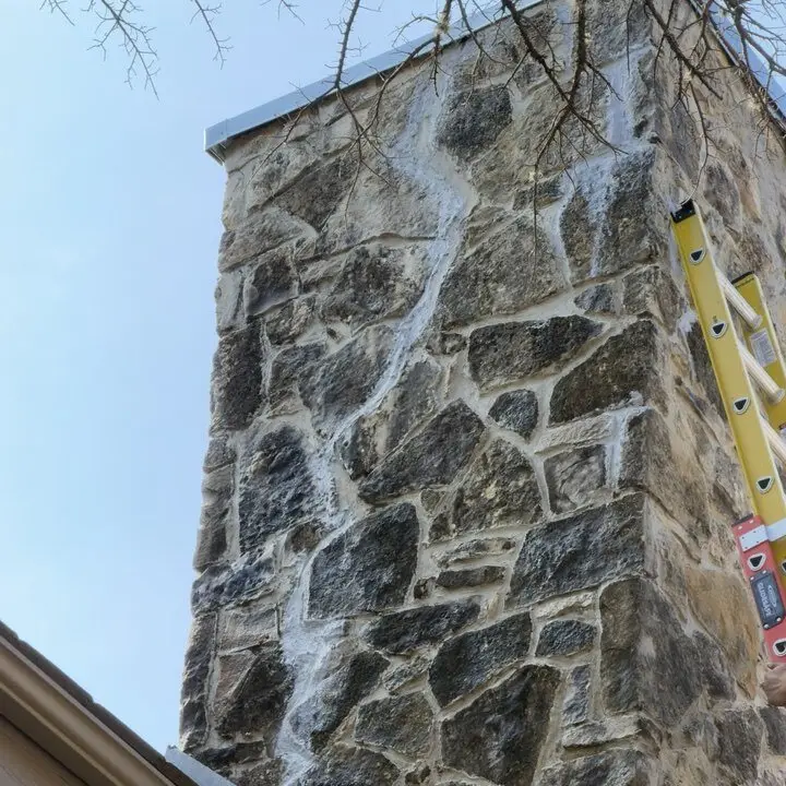Stone chimney after repointing, Central Texas